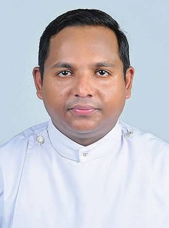 Rev. Bini Jose M.