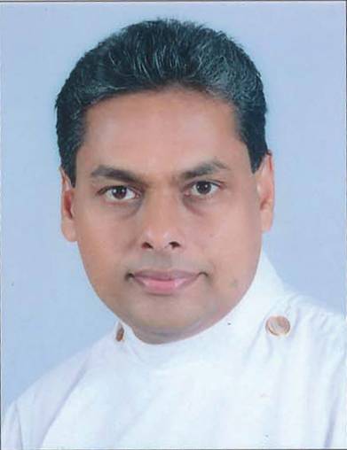 Rev. Saji K. Sam